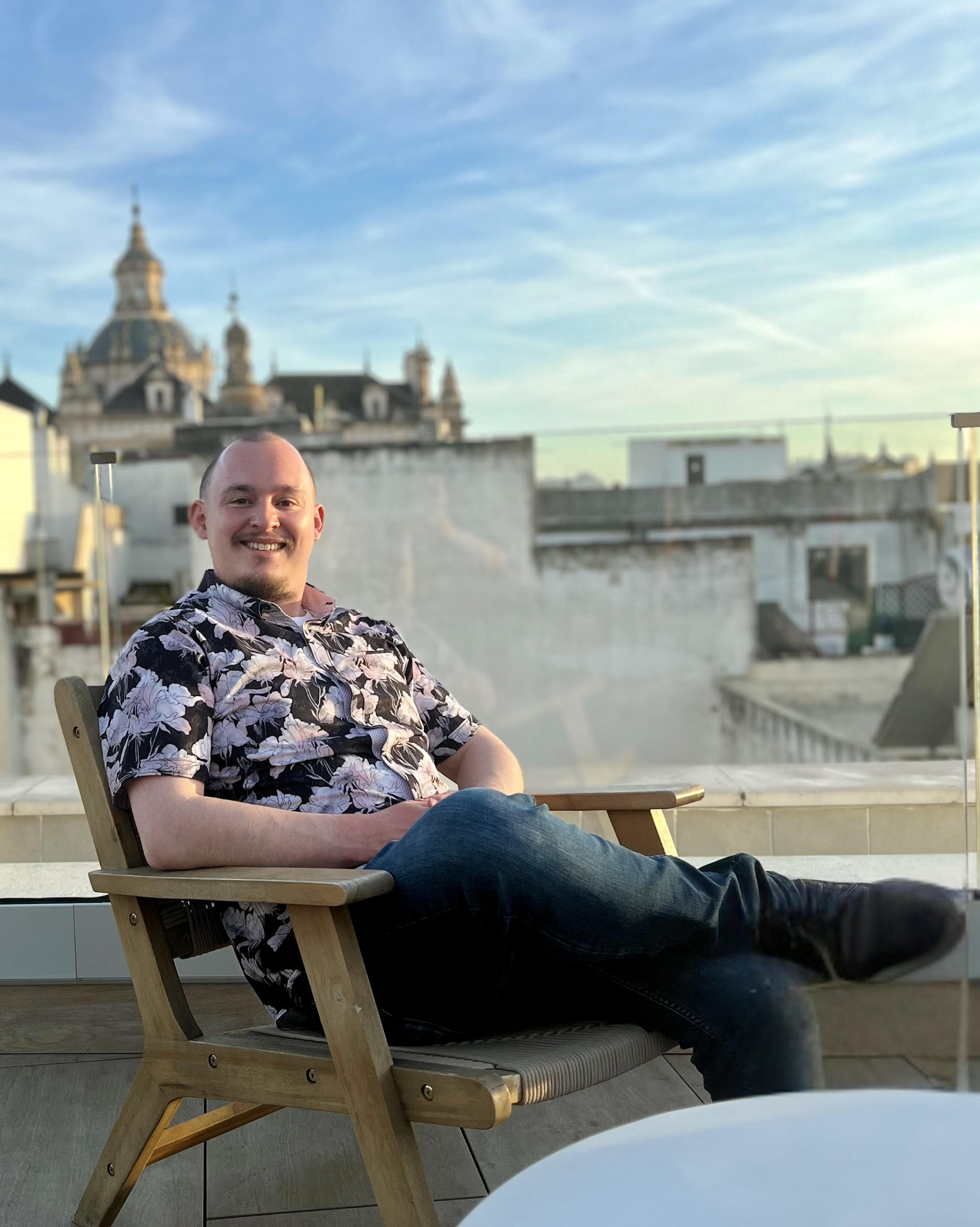 Tyler Goslin on a rooftop terrace abroad